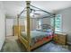 Spacious bedroom featuring a canopy bed, neutral walls, and ample natural light at 2434 Olewoods Ct, Rock Hill, SC 29732