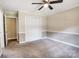 Bedroom featuring neutral walls, carpet and a closet with louvred doors at 2434 Olewoods Ct, Rock Hill, SC 29732
