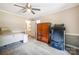 Bedroom featuring neutral walls, carpet, ceiling fan, and a wooden armoire at 2434 Olewoods Ct, Rock Hill, SC 29732
