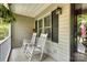 Charming front porch with rocking chairs, creating a welcoming outdoor space at 2434 Olewoods Ct, Rock Hill, SC 29732