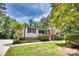 Charming home with a well-manicured front yard, brick accents, and an inviting porch at 2434 Olewoods Ct, Rock Hill, SC 29732