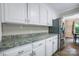 Well-lit kitchen with granite counters, modern appliances, and ample cabinet space at 2434 Olewoods Ct, Rock Hill, SC 29732