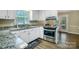 Bright kitchen featuring stainless steel appliances and granite countertops at 2434 Olewoods Ct, Rock Hill, SC 29732