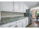 Well-lit kitchen with granite counters, modern appliances, and ample cabinet space at 2434 Olewoods Ct, Rock Hill, SC 29732