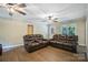 Spacious living room with comfortable seating and ceiling fans for added comfort at 2434 Olewoods Ct, Rock Hill, SC 29732