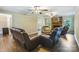 Bright and airy living room with plenty of seating and laminate floors at 2434 Olewoods Ct, Rock Hill, SC 29732