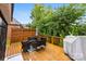 View of a wooden back deck with nice patio furniture and wood fence at 2563 Firethorn Ct, Gastonia, NC 28056