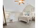 Cozy bedroom with vaulted ceilings, carpeted floors and neutral colors at 2563 Firethorn Ct, Gastonia, NC 28056