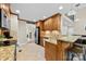 Stylish kitchen with stainless steel appliances, granite countertops, and wooden cabinetry at 2563 Firethorn Ct, Gastonia, NC 28056