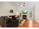 Spacious living room with a fireplace, vaulted ceilings, and hardwood floors at 2563 Firethorn Ct, Gastonia, NC 28056