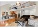 Open concept living room featuring a loft, kitchen, and dining area at 2563 Firethorn Ct, Gastonia, NC 28056