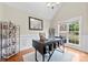 Office featuring hardwood floors, stylish desk with decor, and a view into the neighborhood at 2563 Firethorn Ct, Gastonia, NC 28056