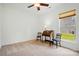 Bedroom features a desk, neutral carpet, and a window for natural light at 258 Cherrytree Dr, Fort Mill, SC 29715