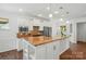 Bright kitchen with white cabinets, granite countertops, and pendant lighting at 258 Cherrytree Dr, Fort Mill, SC 29715