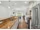 Modern kitchen featuring stainless steel appliances, granite countertops, and tile backsplash at 258 Cherrytree Dr, Fort Mill, SC 29715