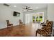 Spacious living room featuring wood floors, natural light, and comfortable seating at 258 Cherrytree Dr, Fort Mill, SC 29715
