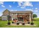 Spacious backyard with a wooden deck, inviting fire pit area, and ample green space for recreation at 2843 Startown Rd, Lincolnton, NC 28092