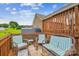 Relaxing deck with comfortable wicker seating, perfect for enjoying outdoor living at 2843 Startown Rd, Lincolnton, NC 28092