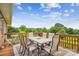 Outdoor dining area with a large table and chairs, perfect for entertaining with a beautiful view at 2843 Startown Rd, Lincolnton, NC 28092