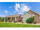 Beautiful brick home with a stone facade, a covered front porch and landscaped front yard at 2843 Startown Rd, Lincolnton, NC 28092