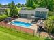 Backyard showcases a private pool area with a charming gazebo, perfect for relaxing and entertaining guests at 2908 Dylan Nw Pl, Concord, NC 28027