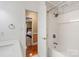 Modern bathroom features marble tile shower/tub combination at 2908 Dylan Nw Pl, Concord, NC 28027