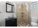 Stylish bathroom with glass sink and tiled shower at 2908 Dylan Nw Pl, Concord, NC 28027