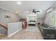 Spacious living room with modern decor and ample seating at 2908 Dylan Nw Pl, Concord, NC 28027