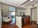 Open concept living area flows into the kitchen with stainless appliances and wood floors at 300 W 5Th St # 723, Charlotte, NC 28202