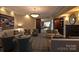 Spacious living room with comfortable seating, fireplace, and elegant decor at 300 W 5Th St # 723, Charlotte, NC 28202