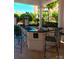 Convenient outdoor kitchen with stainless steel grill, countertop space, and seating for entertaining guests at 300 W 5Th St # 723, Charlotte, NC 28202