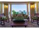 Charming outdoor patio with comfortable seating and serene views at 300 W 5Th St # 723, Charlotte, NC 28202