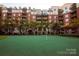 A beautiful putting green surrounded by tall buildings in a residential community at 300 W 5Th St # 723, Charlotte, NC 28202