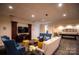 An entertainment room complete with plush seating, a tv, and a billiards table at 300 W 5Th St # 723, Charlotte, NC 28202