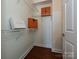 Walk-in closet with wire shelving and hardwood floors at 300 W 5Th St # 723, Charlotte, NC 28202