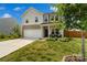 Beautiful home with a well-maintained lawn, featuring a front porch with seating and a charming curb appeal at 3092 Riker St, Clover, SC 29710