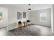 Bright living room features modern decor, stylish chairs, and wood-look flooring at 3092 Riker St, Clover, SC 29710