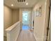 Hallway featuring neutral walls, carpeted floors, and inviting doorways leading to other rooms at 3113 Bouquet St, Charlotte, NC 28215
