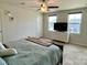Main bedroom with windows, a dresser, and a bed with plenty of pillows at 3113 Bouquet St, Charlotte, NC 28215