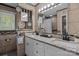 Stylish bathroom featuring a double vanity, granite countertops, and decorative accents at 312 Walton Dr, Statesville, NC 28625