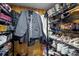 Organized walk-in closet featuring metal shelving and assorted clothing items at 312 Walton Dr, Statesville, NC 28625