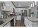 Bright kitchen featuring granite countertops, stainless steel appliances, and a functional center island at 312 Walton Dr, Statesville, NC 28625