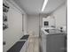 Functional laundry room with storage solutions, washer, and dryer at 312 Walton Dr, Statesville, NC 28625