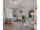 Cozy living room with neutral decor, comfortable seating, and lots of natural light at 312 Walton Dr, Statesville, NC 28625