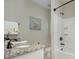 Bathroom with a marble countertop sink, bathtub, and shower at 317 Annatto Way, Tega Cay, SC 29708