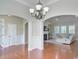 Spacious living area showcasing hardwood floors, a fireplace, and abundant natural light at 317 Annatto Way, Tega Cay, SC 29708