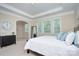 Main bedroom with tray ceilings, and ensuite at 317 Annatto Way, Tega Cay, SC 29708