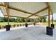 Covered picnic area offering shade, seating, and brick supports for community events and gatherings near the playground at 317 Annatto Way, Tega Cay, SC 29708