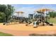 A vibrant community playground with slides, climbing structures, and play areas for ' outdoor fun and recreation at 317 Annatto Way, Tega Cay, SC 29708