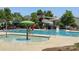 Community pool area features a splash area, water slide, and lounge chairs at 317 Annatto Way, Tega Cay, SC 29708